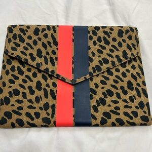 Stella & Dot Leopard Print Clutch with Red and Black Stripes. Never been worn.